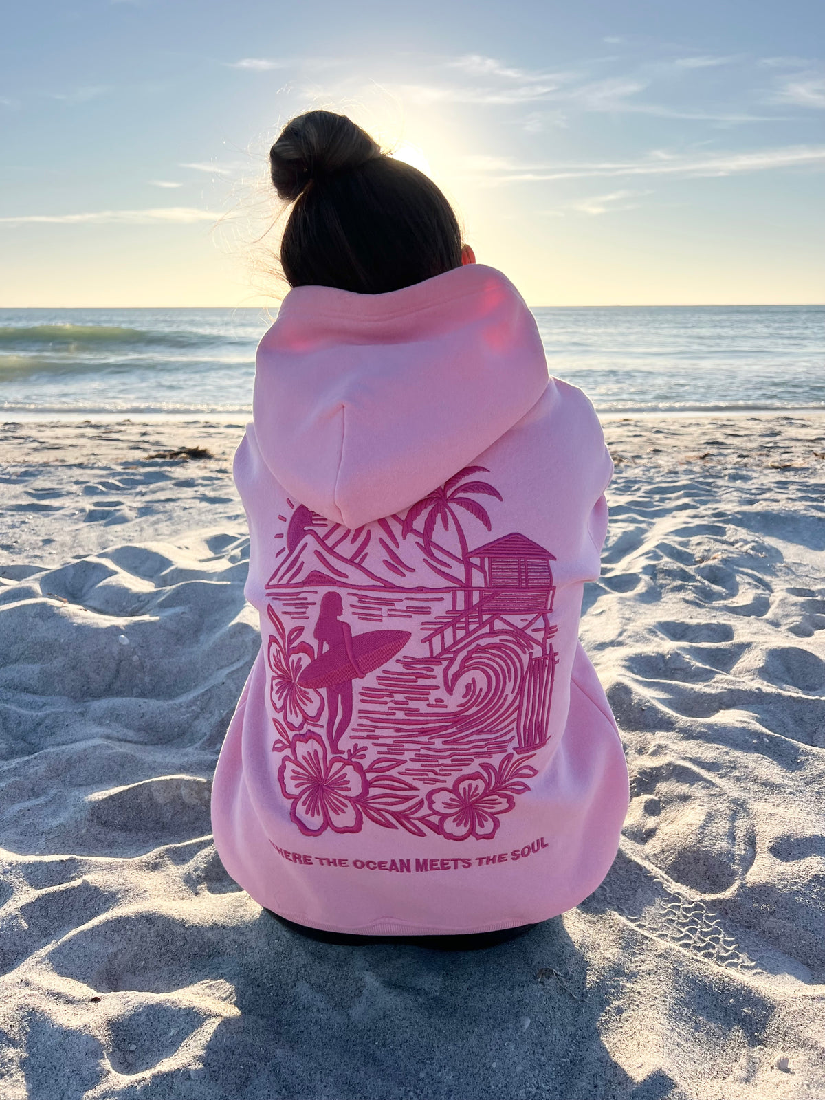 Summit & Coast pink and blue hoodies with coastal, mountain, and jewelry lifestyle details